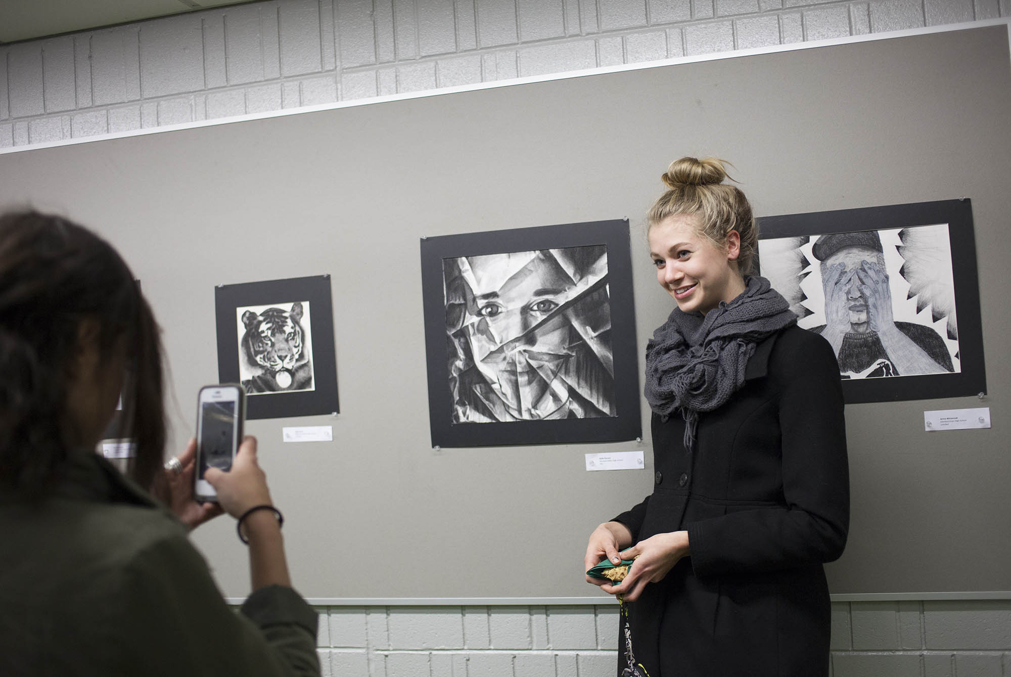 Kylie Harnen (Neuqua Valley High School) next to her work ‘Ally’ - ProTEFL